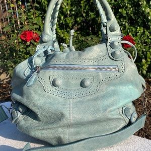 Balenciaga huge PonPom in lt. teal.